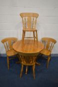 A PINE CIRCULAR PEDESTAL TABLE, diameter 90cm x height 76cm with a set of four chairs (5)