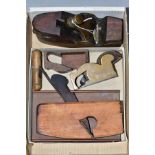 A BOX CONTAINING THREE VINTAGE PLANES AND OTHER TOOLS, including a compassed coopers plane, 1 1/