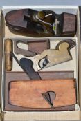 A BOX CONTAINING THREE VINTAGE PLANES AND OTHER TOOLS, including a compassed coopers plane, 1 1/