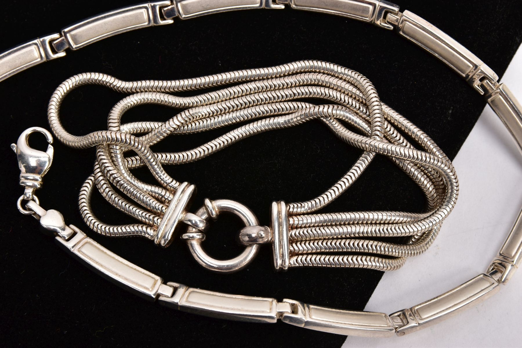 A SILVER ARTICULATED NECKLACE AND A BRACELET, the silver articulated necklace, curved links, - Image 3 of 3