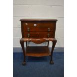 AN VICTORIAN STYLE MAHOGANY SERPENTINE CUTLERY CABINET, the hinged top enclosing a later red