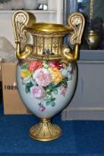 A LATE 19TH CENTURY COPELAND 'COPELANDS JEWELLED PORCELAIN' TWIN HANDLED BALUSTER VASE IN NEED OF
