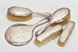 FIVE PIECES OF SILVER VANITY ITEMS, to include two hair brushes, each of a plain polished design