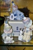 THREE LLADRO PIERROT FIGURES, comprising 'Pierrot with Puppy' 5278 and 5277, tallest approximately