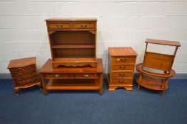 A QUANTITY OF YEW WOOD FURNITURE comprising a rectangular coffee table, bookcase, bedside cabinet,