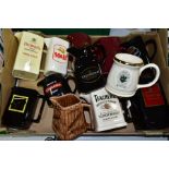 A BOX OF ADVERTISING JUGS, to include twelve jugs, brands to include Dunhill, Teacher's, Carling,