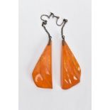 A PAIR OF NATURAL AMBER EARRINGS, the large drop earrings each of a tapered outline suspended from a