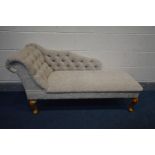 A MODERN BEIGE UPHOLSTERED CHAISE LOUNGUE, on cabriole legs, (no fire safety label but compliant