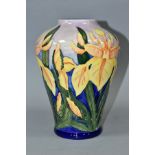 A MOORCROFT POTTERY BALUSTER VASE DECORATED IN THE WINDRUSH PATTERN, yellow irises on a shaded