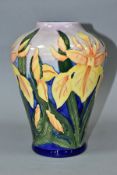 A MOORCROFT POTTERY BALUSTER VASE DECORATED IN THE WINDRUSH PATTERN, yellow irises on a shaded