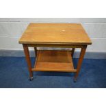 A MID 20TH CENTURY TEAK FOLD OVER CARD TABLE, lined with green baize, on square tapered legs, united