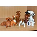 FIVE SMALL BESWICK DOG FIGURES AND ANOTHER SIMILAR, comprising Puppit Dog, model No 1002,