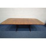 IN THE MANNER OF JENSEN FROKJAER OF DENMARK, A ROSEWOOD EXTENDING TABLE