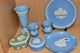 SIX PIECES OF WEDGWOOD JASPERWARE AND AN EMBOSSED QUEEN'S WARE CONICAL VASE, height 16.5cm, the