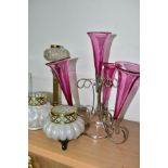 A SILVER PLATED FOUR BRANCH CRANBERRY GLASS EPERGNE, the trumpets being 20th century replacements,