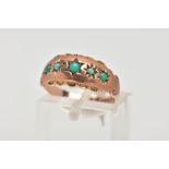AN EARLY 20TH CENTURY ROSE GOLD TURQUOISE SET RING, designed with five star set, graduated, circular