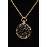 AN EARLY VICTORIAN MEMORIAL LOCKET NECKLACE, the locket of a circular form, decorated with black