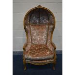 A REPRODUCTION LOUIS XVI STYLE BEECH FRAMED PORTER'S CHAIR, covered in floral upholstery, width 75cm