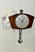 A SCHATZ ELEXACTA MID 20TH CENTURY WALL CLOCK, with original instructions, battery operated (