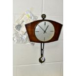 A SCHATZ ELEXACTA MID 20TH CENTURY WALL CLOCK, with original instructions, battery operated (