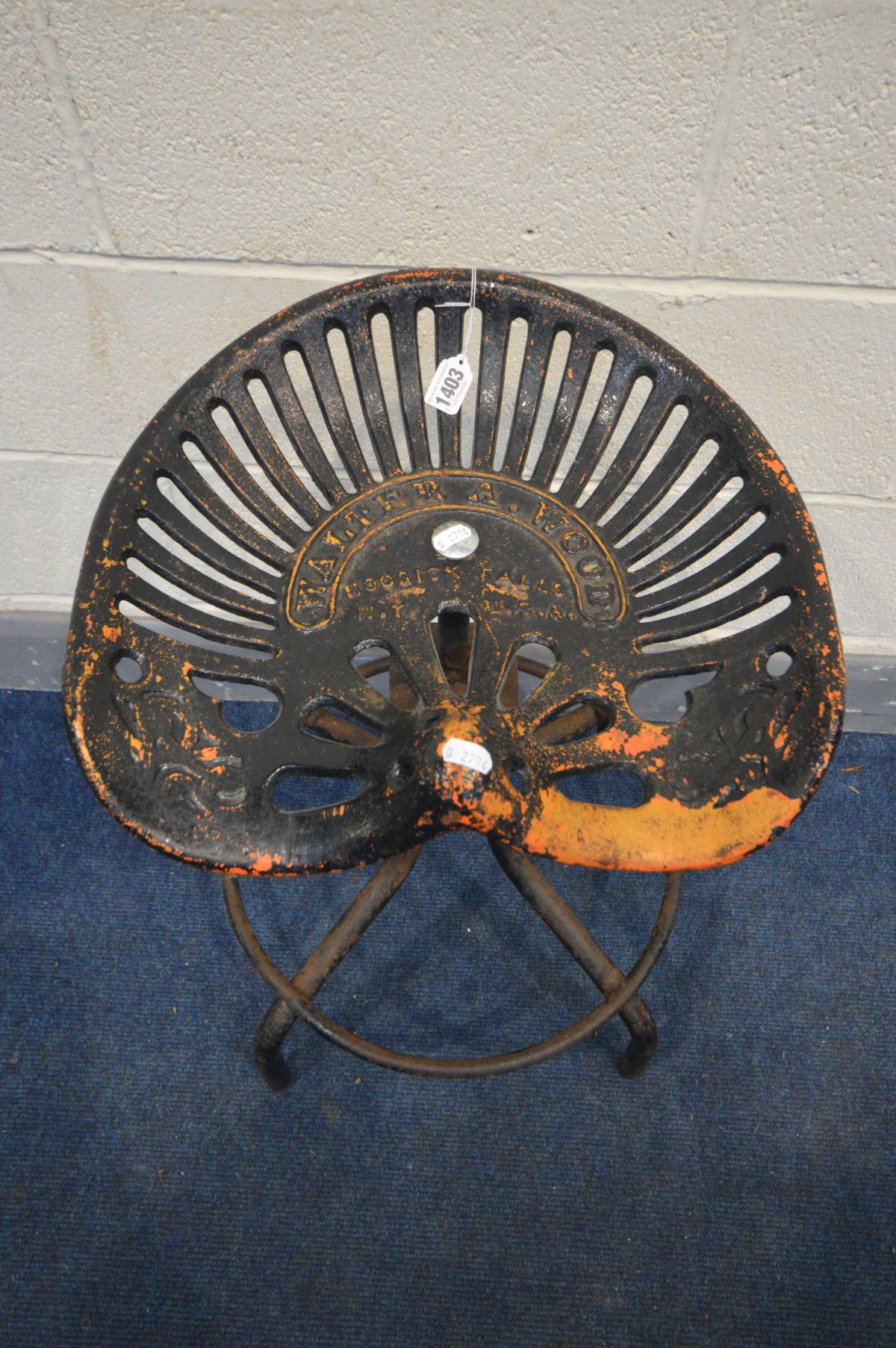 A METAL SWIVEL STOOL, the tractor seat marked Walter A Wood, on a matched tubular base, height 71cm - Image 2 of 3