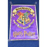 HARRY POTTER 'HOGWARTS' POSTER, signed by eight members of the cast, 90cm x 64cm.