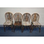 A SET OF FOUR OAK WHEELBACK CHAIRS