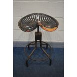 A METAL SWIVEL STOOL, the tractor seat marked Walter A Wood, on a matched tubular base, height 71cm