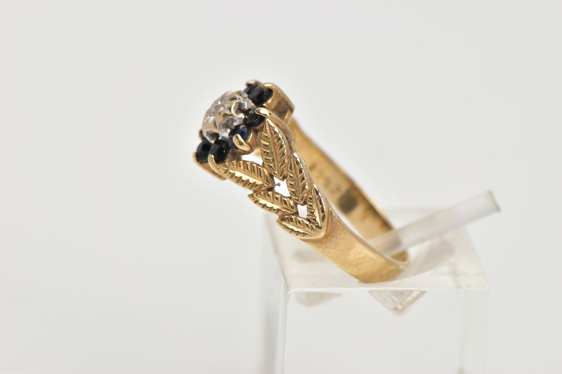 A 9CT GOLD SAPPHIRE AND DIAMOND CLUSTER RING, designed with a star set, single cut diamond, within a - Bild 2 aus 4