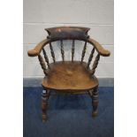 A 19TH CENTURY ELM SMOKERS ARMCHAIR