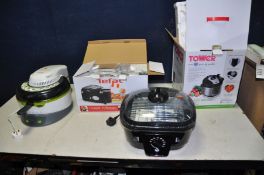 FOUR ITEMS OF HOUSEHOLD ELECTRICALS, including a Tower Pressure Cooker brand new in box, a Tefal