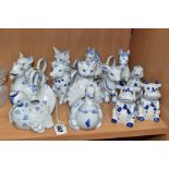 ELEVEN FRANKLIN MINT 'COUNTRY FRIENDS BY HALLIE GREEN' BLUE AND WHITE PORCELAIN JUGS OF ANIMAL FORM,