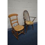 AN ERCOL MODEL 365A QUAKER BACK ARM CHAIR, and a beech rocking chair with a cane seat (2)