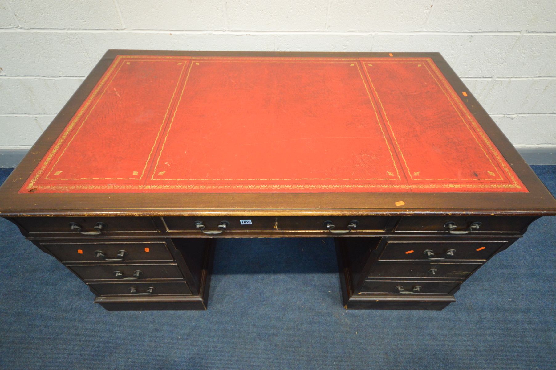 A LARGE REPRODUCTION MAHOGANY PEDESTAL DESK, with a red leather and gilt tooled inlay top, and eight - Image 2 of 3