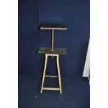 A MID 20TH CENTURY ARTIST MODELLING TABLE (possibly a converted stool) with shaped angle iron legs