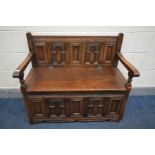 AN OLD CHARM CARVED OAK MONKS BENCH, width 99cm x depth 50cm x height 84cm