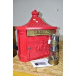 A CONTEMPORARY LETTER BOX IN A VINTAGE STYLE AND A MINERS LAMP, comprising brass and chrome