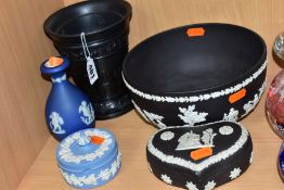 FIVE PIECES OF 20TH CENTURY WEDGWOOD JASPERWARE, comprising a black basalt conical vase lacking