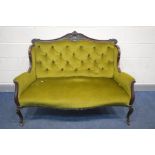 A 20TH CENTURY FRENCH TWO SEATER SOFA, carved top rail to downward swept arms, buttoned back and