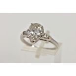 AN EARLY TWENTIETH CENTURY LARGE PEAR SHAPE DIAMOND RING. A principle pear cut diamond estimated