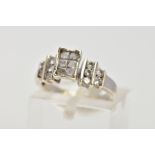 A 9CT GOLD DIAMOND RING, the ring head of a rectangular form, set with six princess cut diamonds,