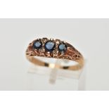A 9CT GOLD SAPPHIRE AND DIAMOND RING, designed with three circular cut blue sapphires, interspaced