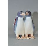 A DANISH PORCELAIN FIGURE GROUP OF TWO PENGUINS, printed and painted marks to the base, height