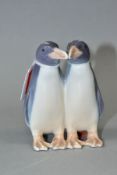 A DANISH PORCELAIN FIGURE GROUP OF TWO PENGUINS, printed and painted marks to the base, height