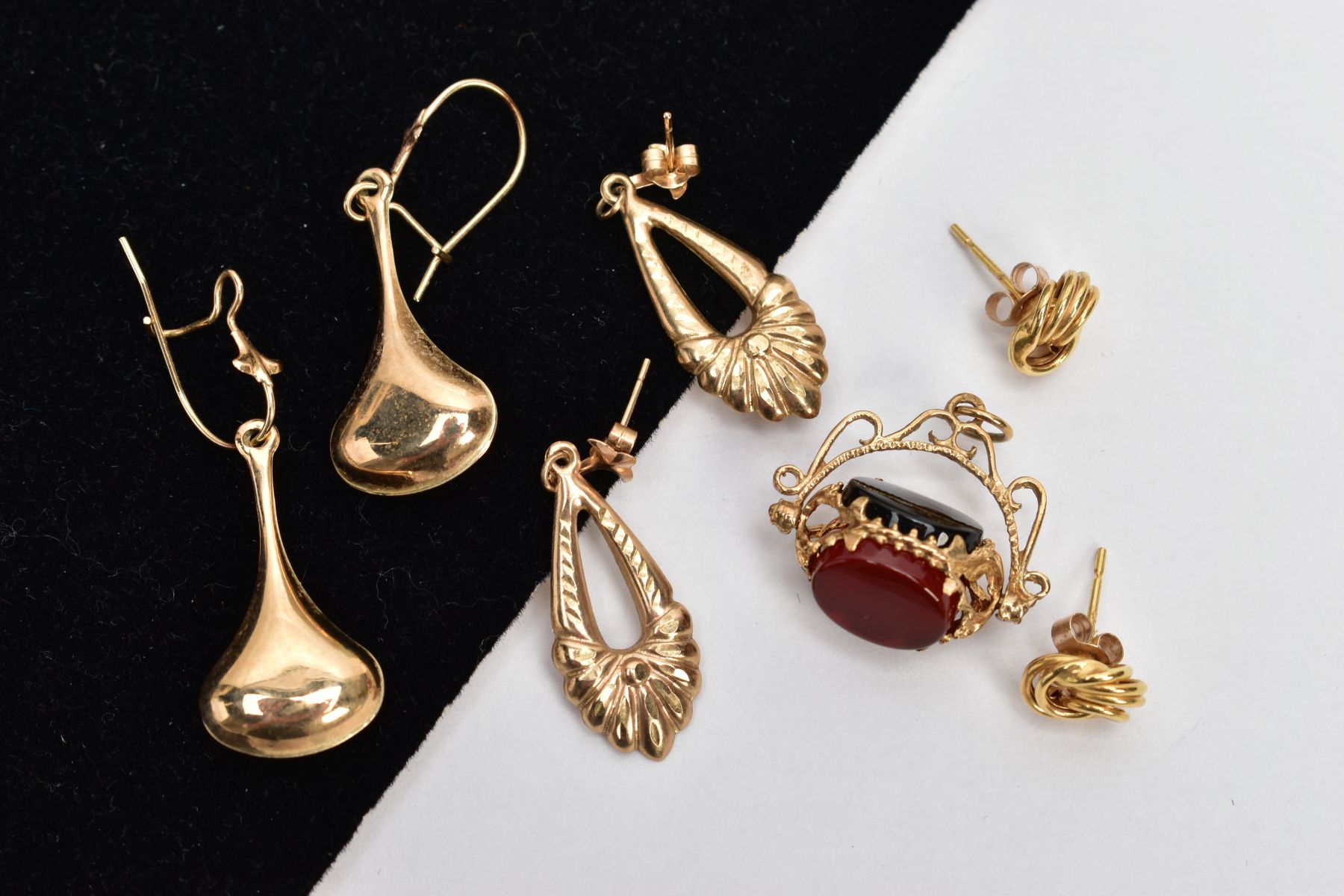 THREE PAIRS OF YELLOW METAL EARRINGS AND A SWIVEL FOB PENDANT, to include two pairs of drop