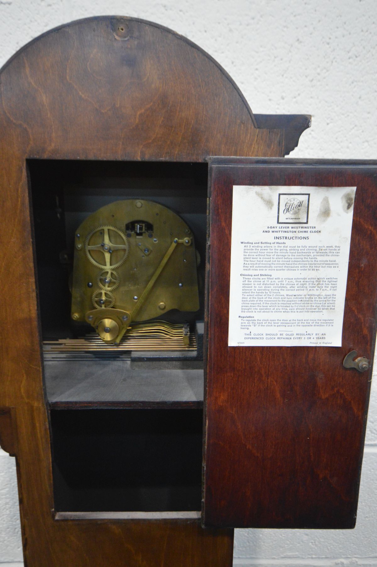 A MAHOGANY EIGHT DAY GRANDDAUGHTER CLOCK, with a brass and silvered dial, tempus fugit label to - Image 3 of 5