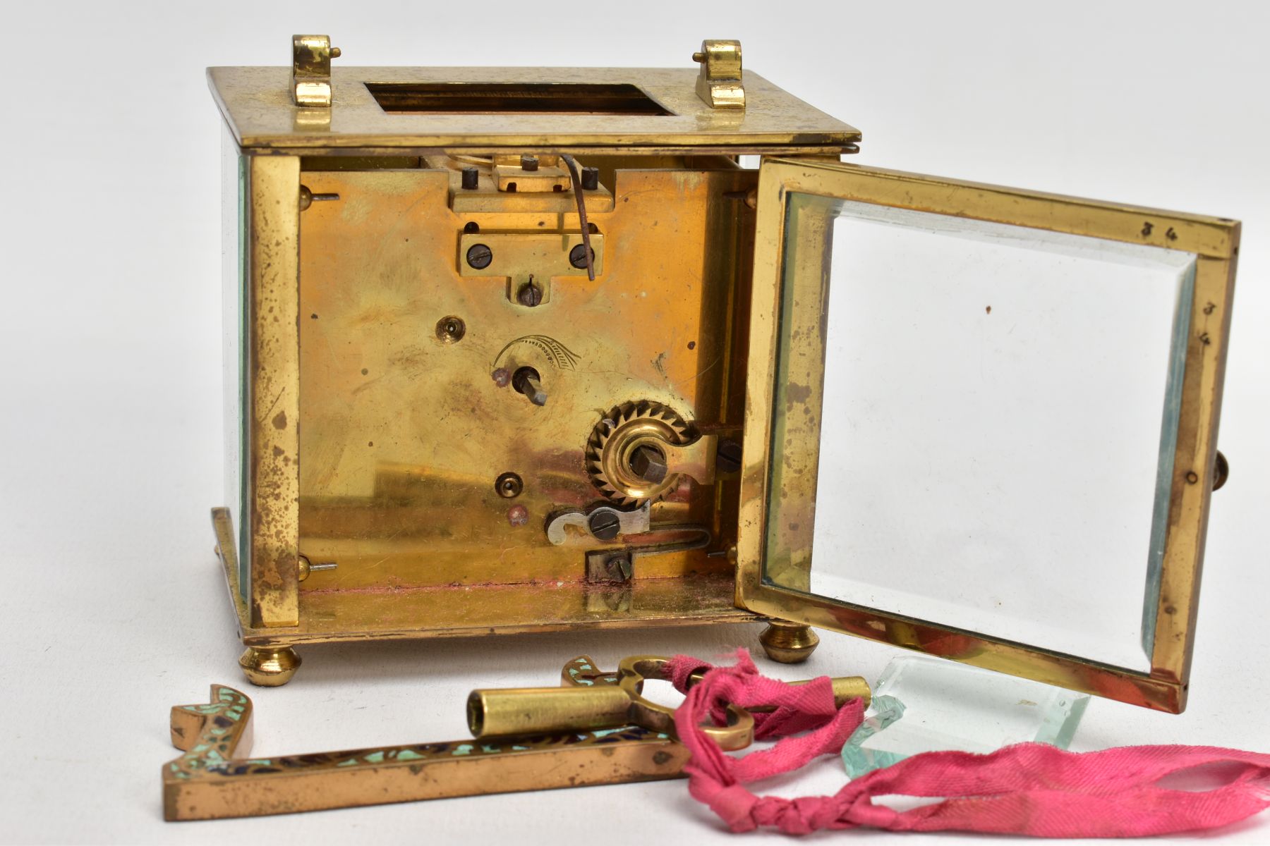 A BRASS AND ENAMELLED CARRIAGE CLOCK, of a square form, round white dial with the centre decorated - Image 4 of 6