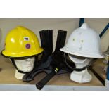 FIRE SERVICE INTEREST - TWO HELMETS, BOOTS AND AXE, the axe head in a sturdy leather pouch