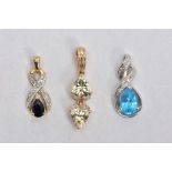 THREE GEM SET PENDANTS, the first set with two triangular cut green stones assessed as topaz,