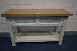 A PARTIALLY CREAM PAINTED AND OAK SIDE TABLE, with two drawers, width 121cm x depth 41cm x height